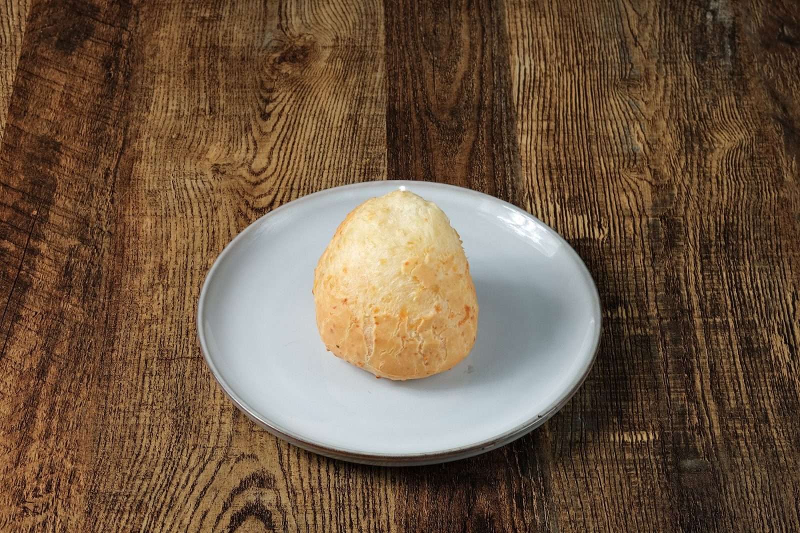 A golden cheese bread roll