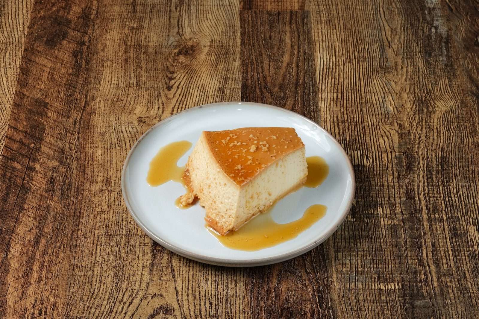 A slice of Brazilian pudim, caramel flan